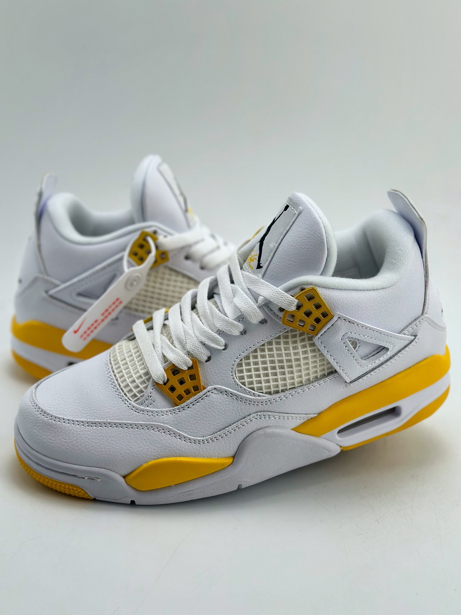 Air Jordan 4 Retro White and Yellow
