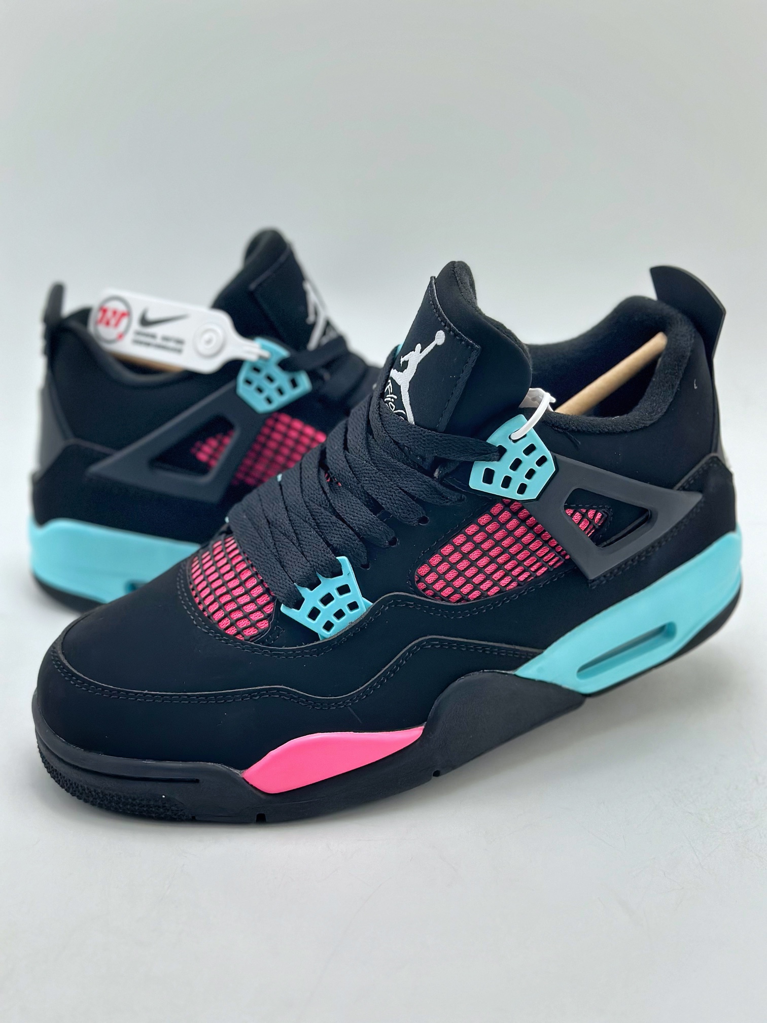Air Jordan 4 Retro Black, Blue and Pink