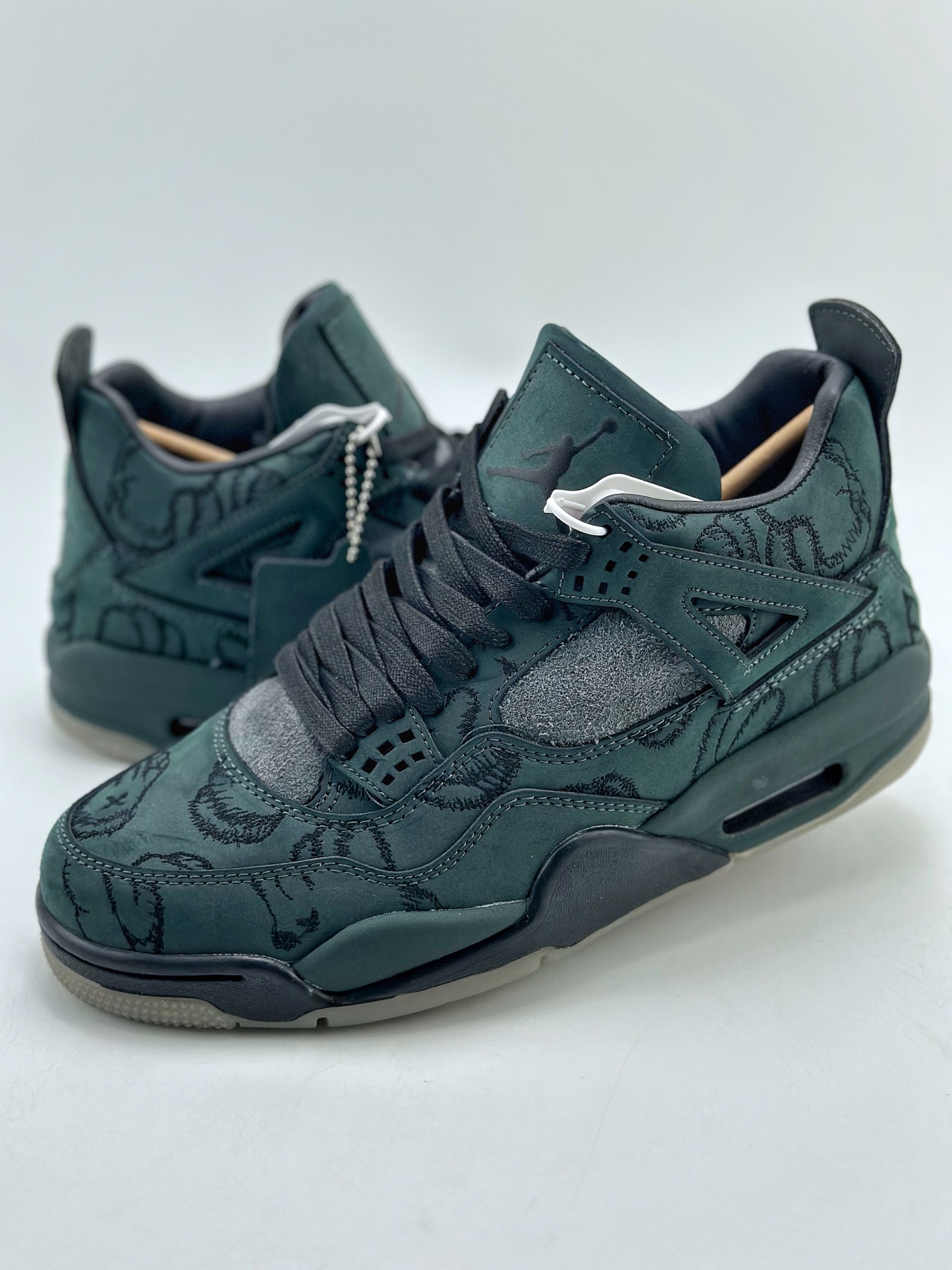 Air Jordan 4 Retro x KAWS Black Suede