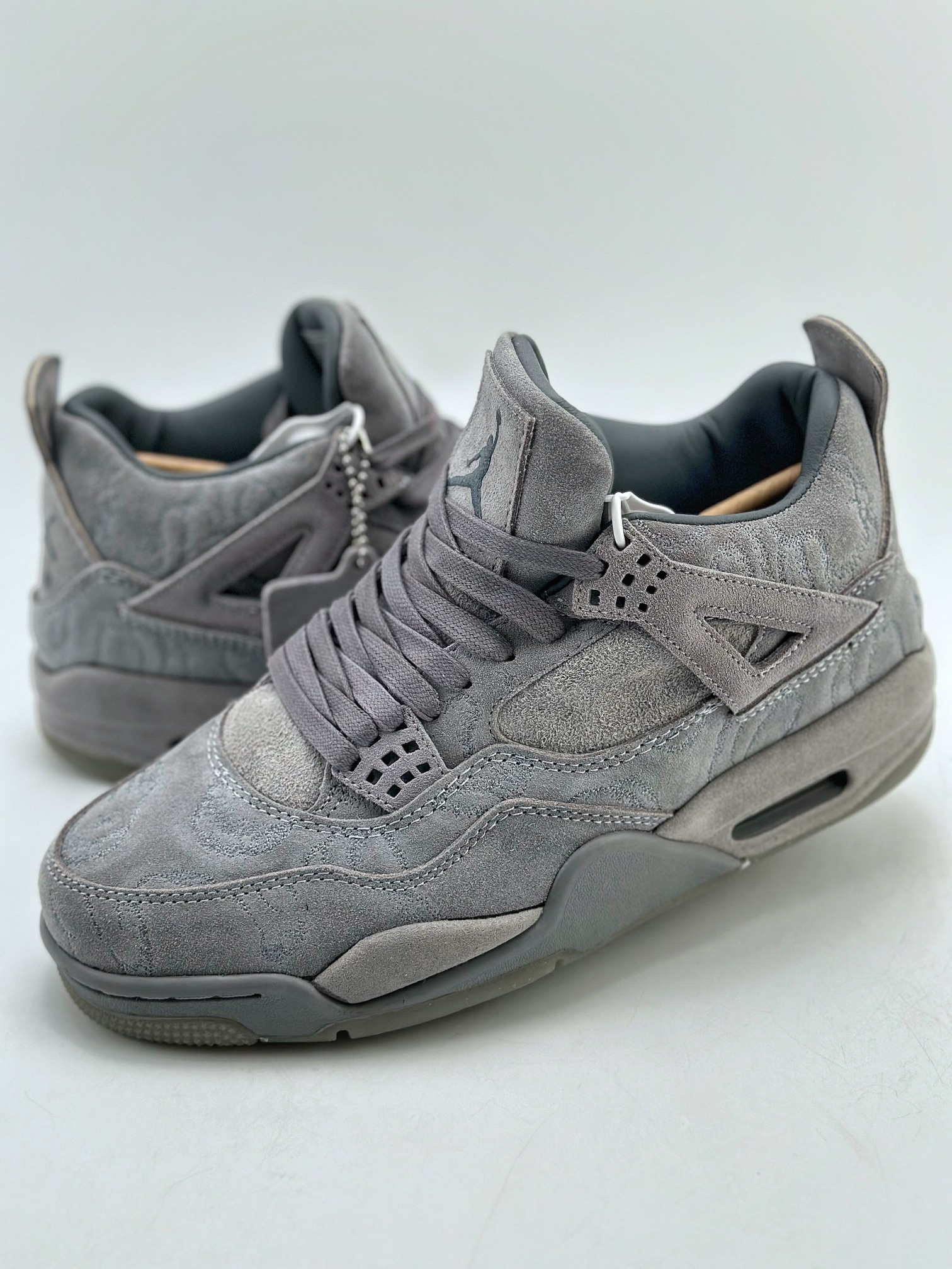 Air Jordan 4 Retro x KAWS Grey Suede