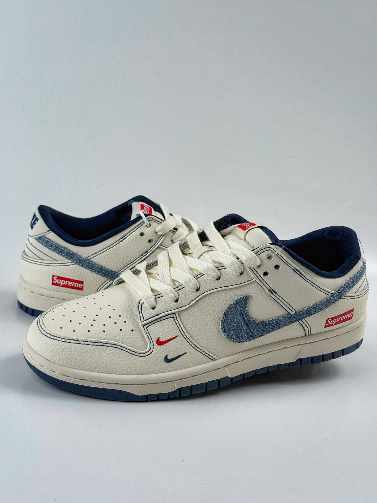 Nike SB Dunk Low x Superme White and Blue Denim Double Swoosh