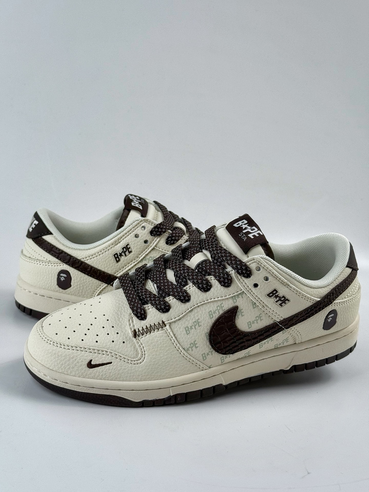 Nike SB Dunk Low x BAPE White and Black Swoosh Star