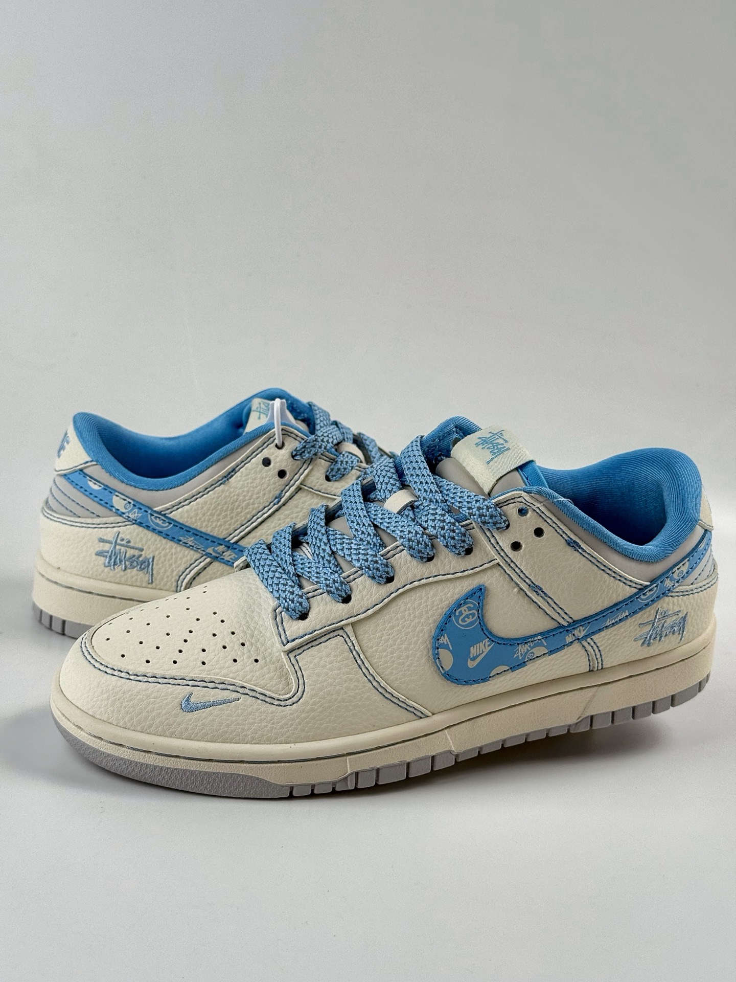 Nike SB Dunk Low x Stussy White Blue Swoosh Star