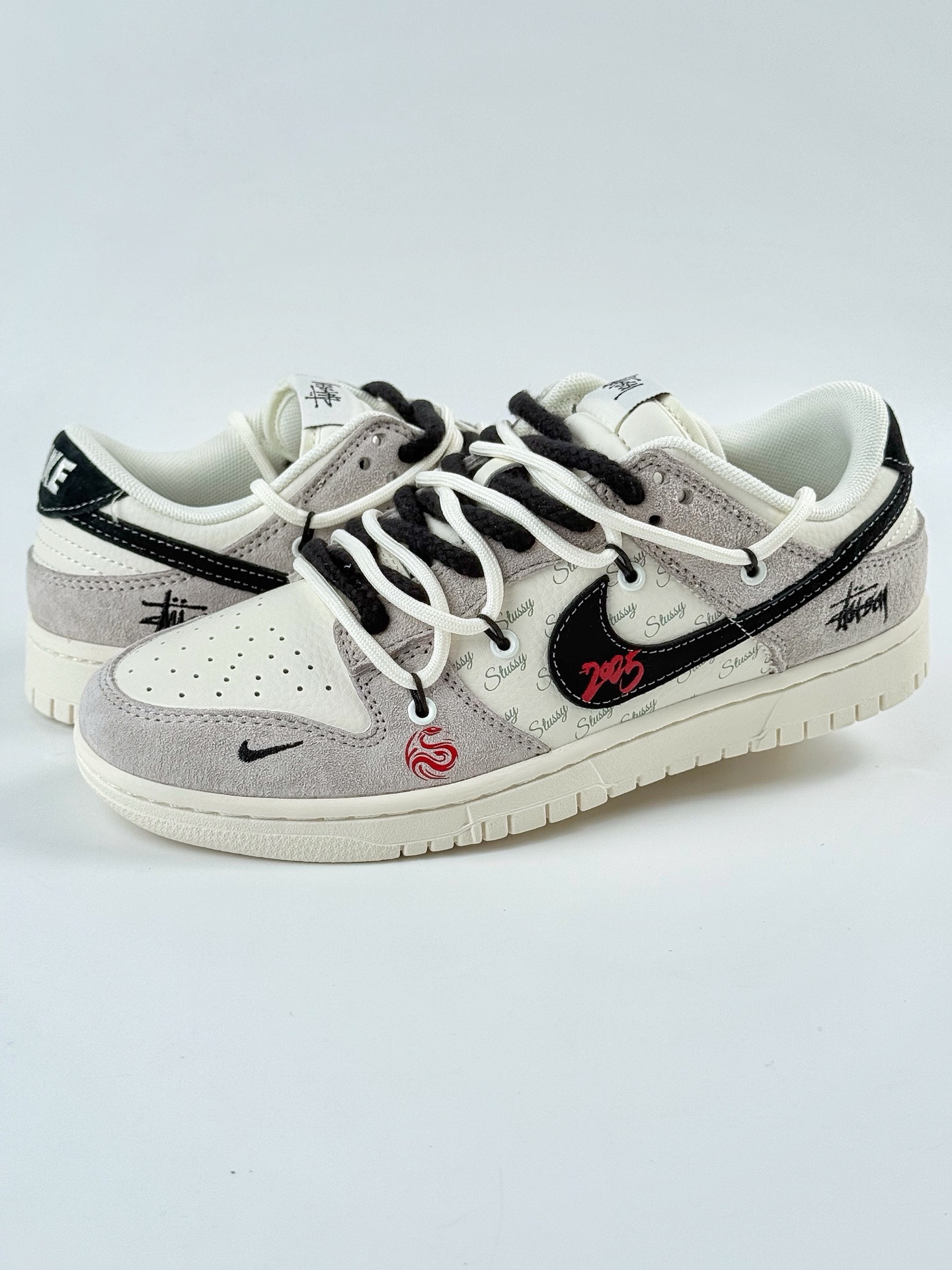 Nike SB Dunk Low x Stussy gray and white small hook strap